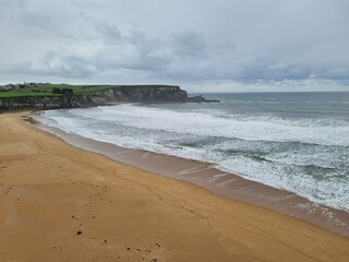 Cloudy evening on the beach of the Bay of Biscay, the Basque country