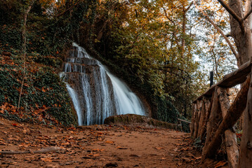 Scenic waterfall cascading down rocks in Monasterio de Piedra, Spain