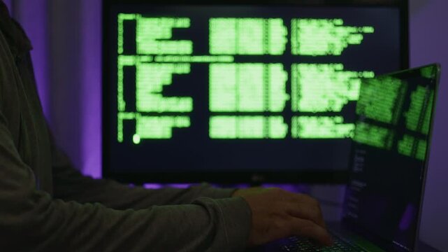 Monitoring logs with bright screen, Laptop mirror showing active coding and log analysis scene, Scene depicting detailed debugging with laptop and expansive monitor in subdued purple lighting