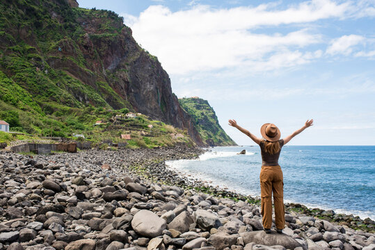 Woman enjoying coastal view in Madeira, Portugal