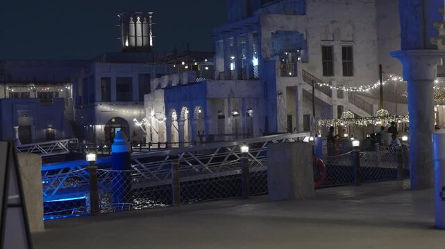 atmospheric Night View of Heritage Waterfront Promenade in Dubai