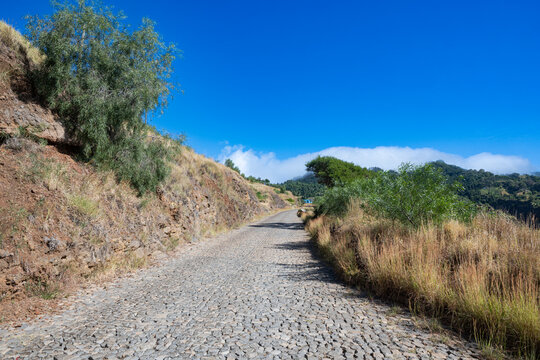 Scenic Estrada da Corda on Santo Ant&atilde;o - Cobblestone road and mountain views