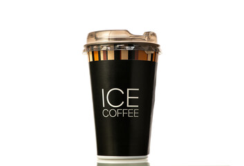 A black cup with a white lid and the word Ice Coffee written on it