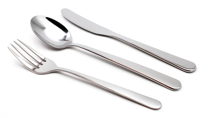 Silverware trio: fork, spoon, and knife, poised for a meal. Gleaming utensils suggest a sophisticated table setting, awaiting delicious cuisine and memorable moments.