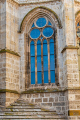 One of the Gothic stone windows of the apse of Palencia Cathedral, Spain.