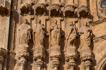 Detail of the Gothic stone sculptures of the Bishop's Gate of Palencia Cathedral, Spain