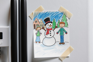 A cheerful family of three enjoys a snowy day, creating a snowman together, reflecting joy, togetherness, and the simple pleasures of the season.