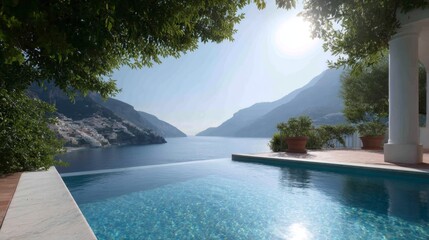 A stunning infinity pool overlooks calm blue waters and majestic mountains. This tranquil setting invites relaxation and peace. Perfect for vacation inspiration and dream planning. AI
