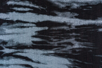 Dark Charcoal Fabric Texture with Abstract Blue-Gray Speckled Effect