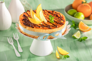 Tasty and fresh cheesecake made of fresh fruits and chocolate.