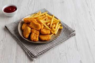 Chicken Nuggets served with French Fries and Ketchup