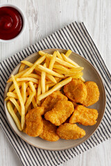 Chicken Nuggets served with French Fries and Ketchup