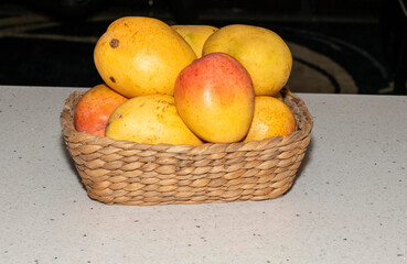 Basket full of Ripe Mangoes