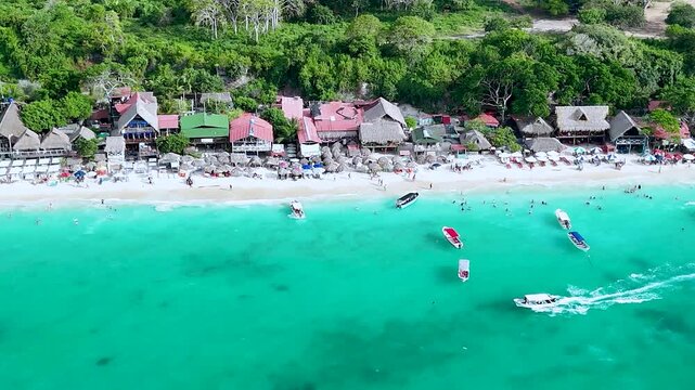 Aerial flyover of Isla Tranquila and nearby coastal areas in the Rosario Islands, Colombia, in July 2025.