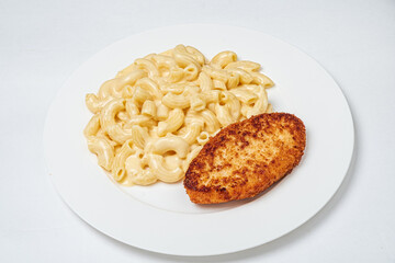 A delicious serving of creamy macaroni and cheese alongside a golden brown chicken patty