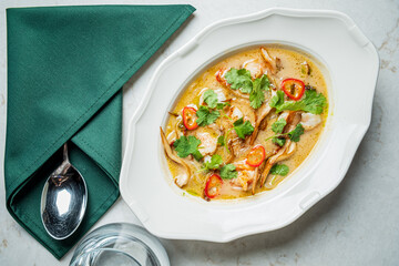 A rich, flavorful soup with shrimp, herbs, and chili sits invitingly, ready to be enjoyed