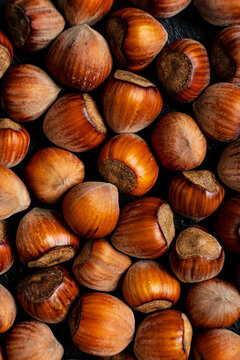 Richly colored hazelnuts create an inviting display, highlighting their natural beauty and texture