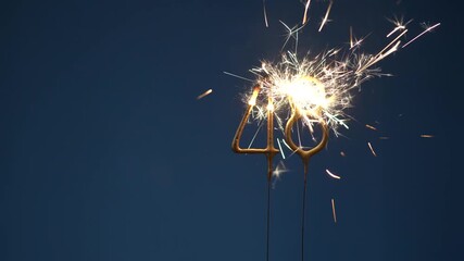 48 years celebration festive background made with Bengal fires in the form of number Forty eight.