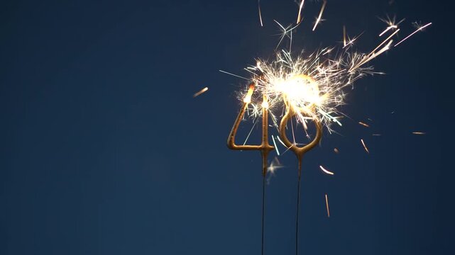 48 years celebration festive background made with Bengal fires in the form of number Forty eight.