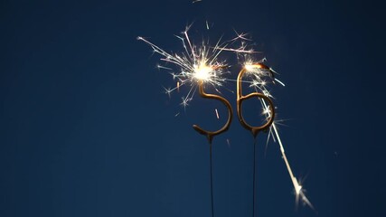 56 years celebration festive background made with Bengal fires in the form of number Fifty six.