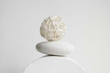 A balanced set of pieces made from natural materials&mdash; a decorative ball, a stone, and a plaster sphere. Authentic natural life in the trendy color of 2026.