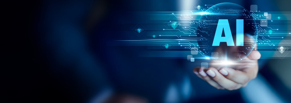 AI concept, Businessman hold AI text with smart data-driven technology, automation, predictive analytics and intelligent digital transformation. - Powered by Adobe