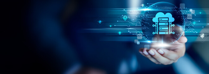Fototapeta premium Cloud Computing concept, Businessman hold Cloud Computing icon on a virtual cloud network interface with scalable infrastructure, digital access and modern technology solutions.