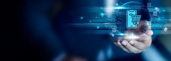 Mobile Commerce concept, Businessman hold Mobile Commerce icon. online shopping, mobile payments, fast checkout, digital retail, customer convenience, sales mobility