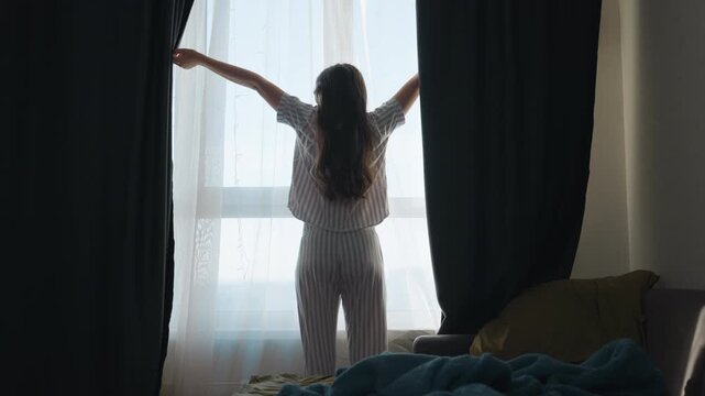Sunlight Streams Into Cheerful Bedroom Setting, Start Of Day Filled With Hope And Radiant Energy Flows Inside, Woman Opens Curtains Wide To Embrace New Day With Enthusiasm And Positive Vibes