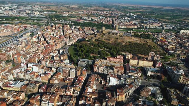 An Aerial panoramic view of the old town of the city Lleida on a sunny summer noon in Spain.