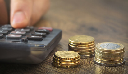 Coins and calculator for personal home finance