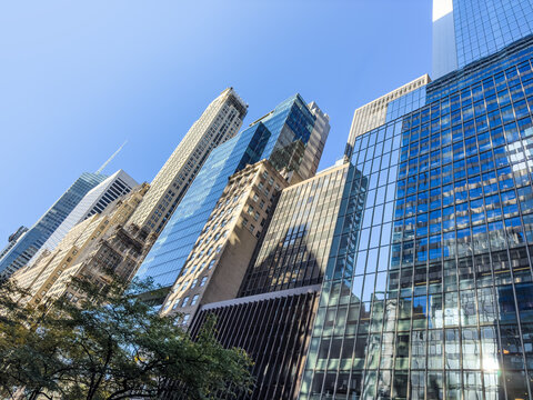 Modern Skyscrapers and Glass Buildings in Midtown Manhattan on a Clear Sunny Day