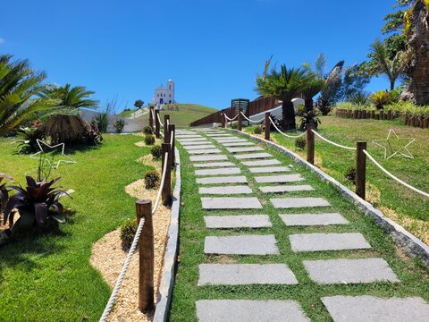Church of Our Lady of Nazareth in Saquarema overlooks surf beaches and the Stone House Square, a site of geological history, blending faith, nature, science and culture in one destination.
