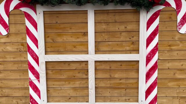 Christmas Wooden Wall Background with Candy Canes and White Window Frame