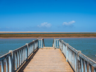 Fototapeta premium Wooden Pier Over Naila Lagoon in the Moroccan Sahara