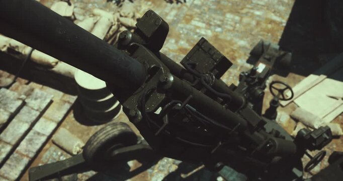 A powerful piece of artillery stands ready for action among scattered debris on a war torn landscape. The machinery looms large, showcasing its strength and purpose in a tense environment.