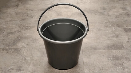 Gray plastic bucket for wet floor cleaning