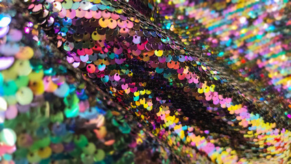 Sparkling multicolor surface perfect for fashion backgrounds, party themes, glitter designs, and decorative visuals.