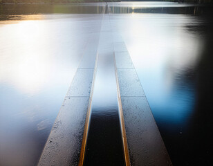 Abstract light path with water reflection