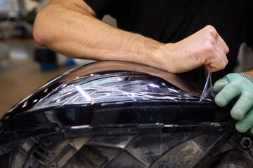 Applying a Protective Film on the Surface of Your Car for Enhanced Durability and Shine