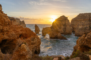 Ponta da Piedade Arches, Rock Formations, Cliffs and Atlantic Ocean at Sunrise. Algarve, Portugal