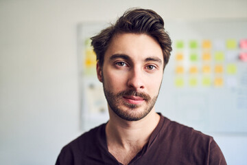 Portrait of confident young man in office