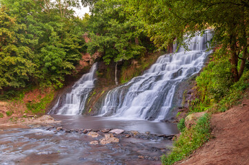 Beautiful summer view of the Chervonohorod (Dzhuryn) waterfall in Ternopil region, Ukraine