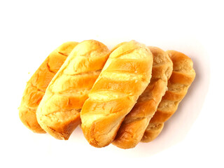 Stack of top quality French brioche rolls on white background. Fine gold and soft pastry product. Premium dessert.
