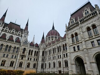 Fototapeta premium The Hungarian Parliament building in Budapest during the day in cloudy weather.