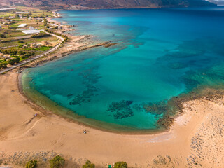 Aerials of Trachilos and Viglia Beach and storm clouds over Gerosk&iacute;nos, Crete, Greece