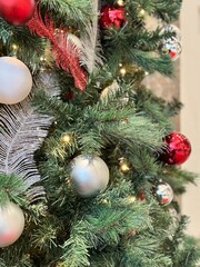 Decorated Christmas Tree with Red and Silver Ornaments