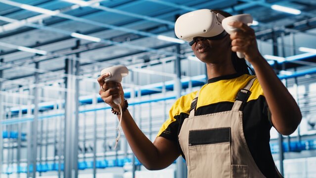 Photovoltaics smart factory technician fixing damaged IoT sensors using VR headset. Engineer in industry 4.0 solar panels plant using virtual reality find errors and reduce downtime, camera A - Powered by Adobe