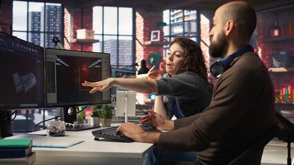 Two developers team interact with virtual AI assistant on PC to design a game hub, using machine...
