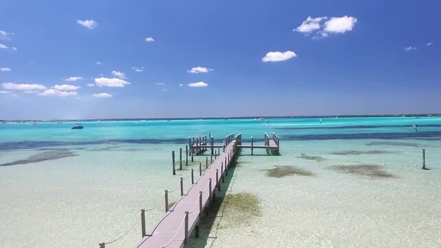Aerial Drone Flyover of Dock and Shallow Emerald Water, Destin Florida